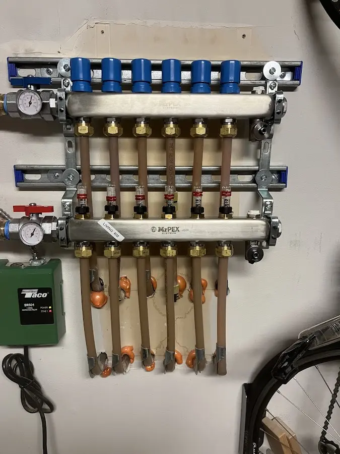 Plumber performing Water Heater Repair at a residential property in Waterford